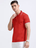 front left view of primoknit drift polo tshirt unisex for men Red