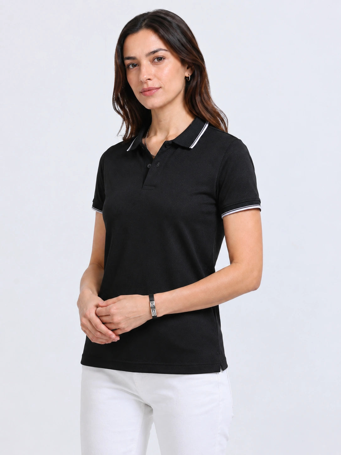 side view of primoknit drift polo tshirt unisex for women Black