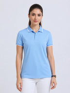 front view of primoknit drift polo tshirt unisex for women Sky Blue