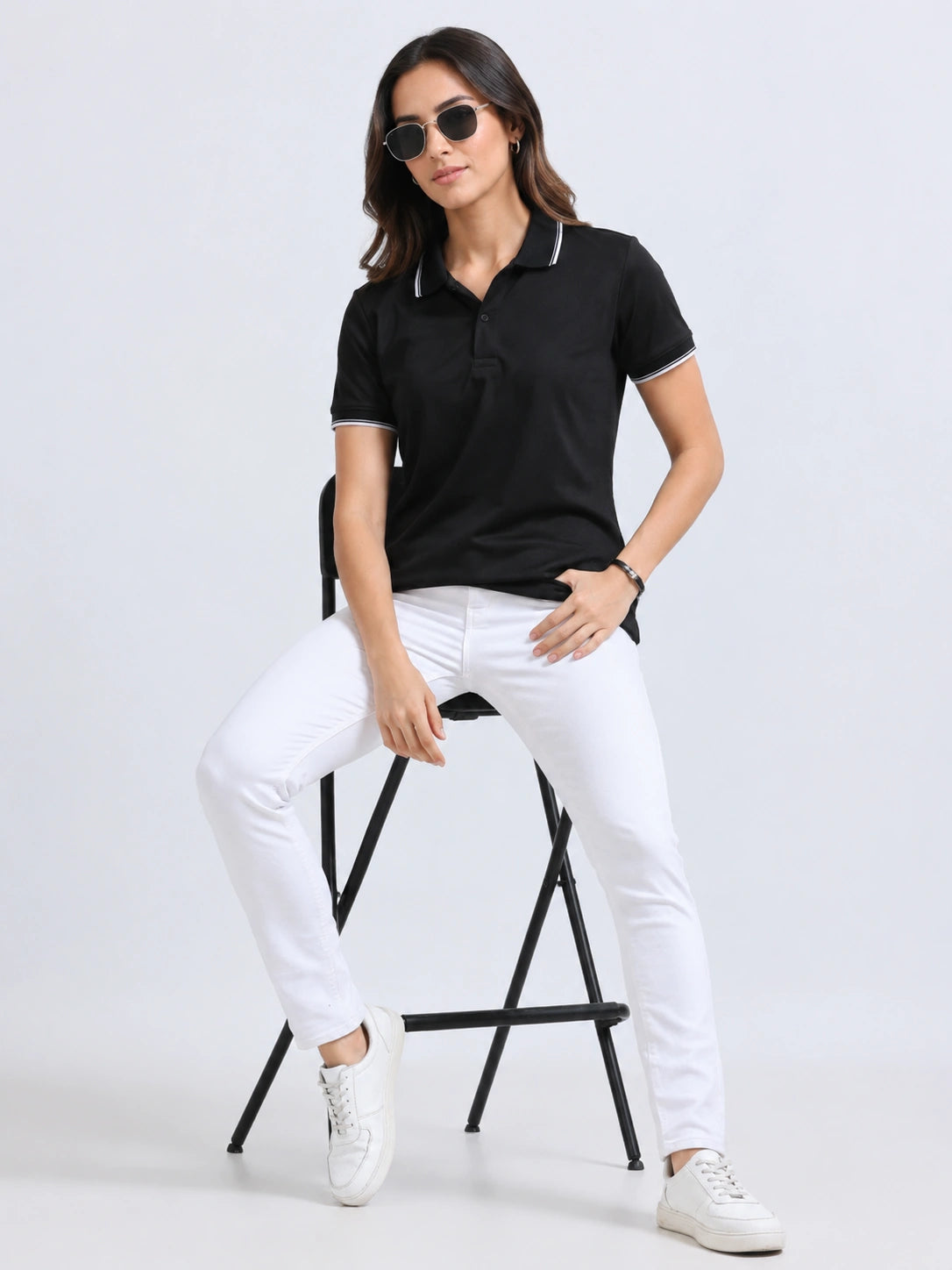 photo view of primoknit drift polo tshirt unisex for women Black