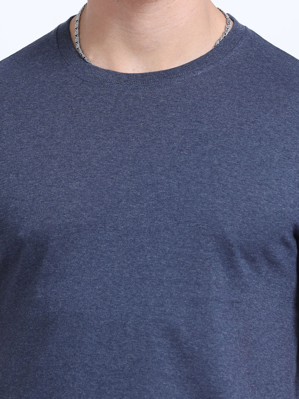 close view of man wearing t-shirt whose colour is Navy Melange