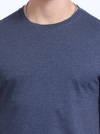 close view of man wearing t-shirt whose colour is Navy Melange