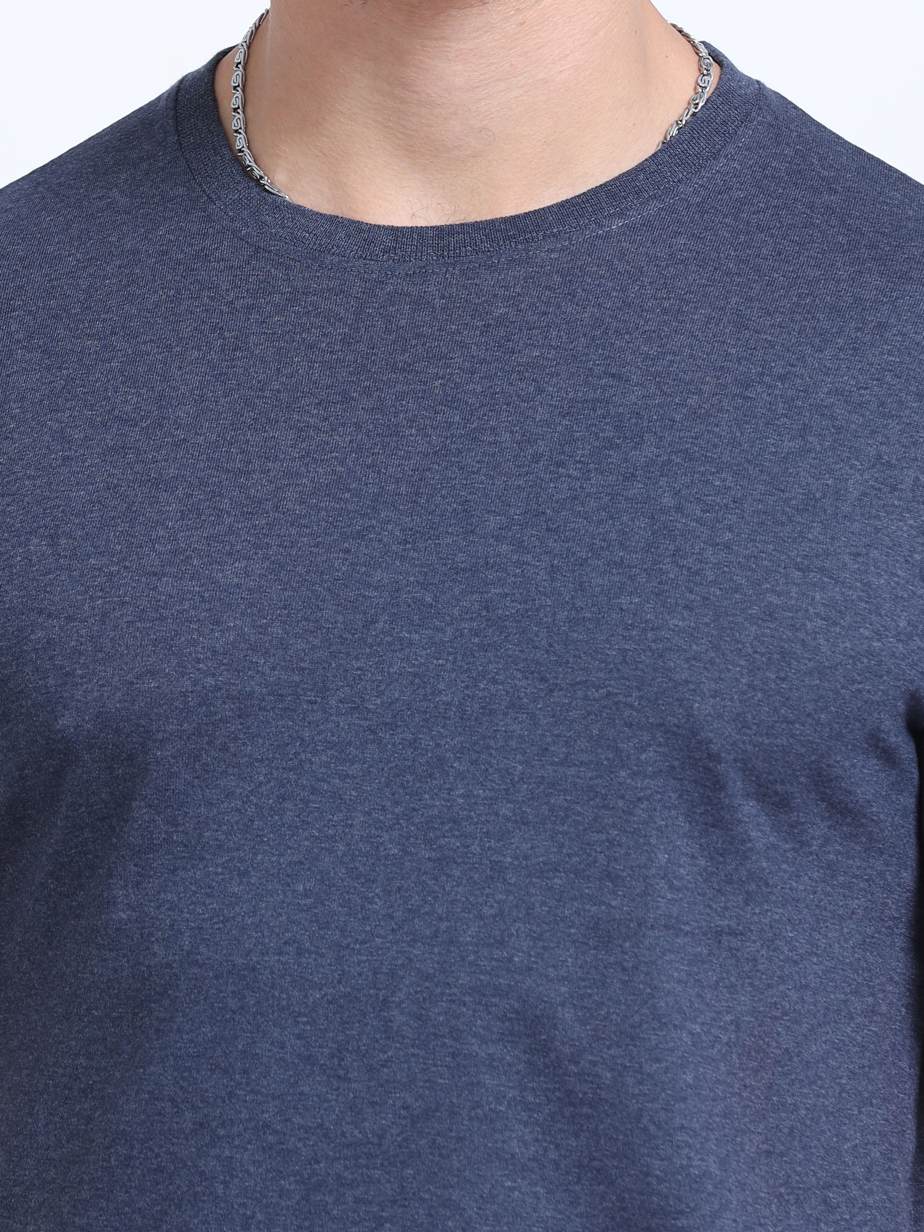 close view of man wearing t-shirt whose colour is Navy Melange