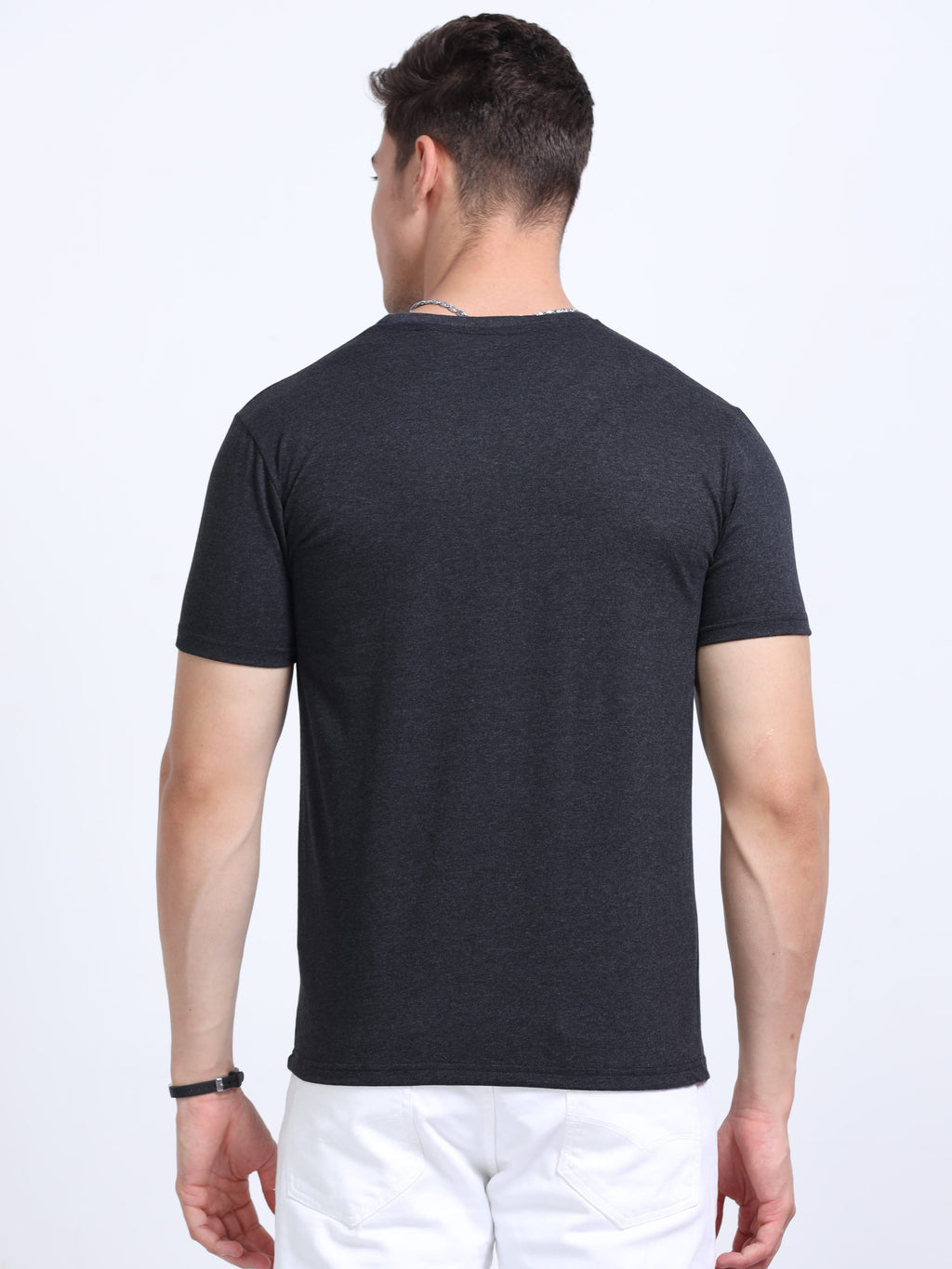 back view of man wearing t-shirt whose colour is Charcoal