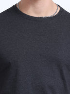close view of man wearing t-shirt whose colour is Charcoal