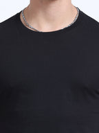 Man wearing a t-shirt with close view in  black 