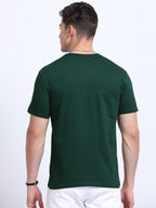 Man wearing a t-shirt with back view in bottle green 