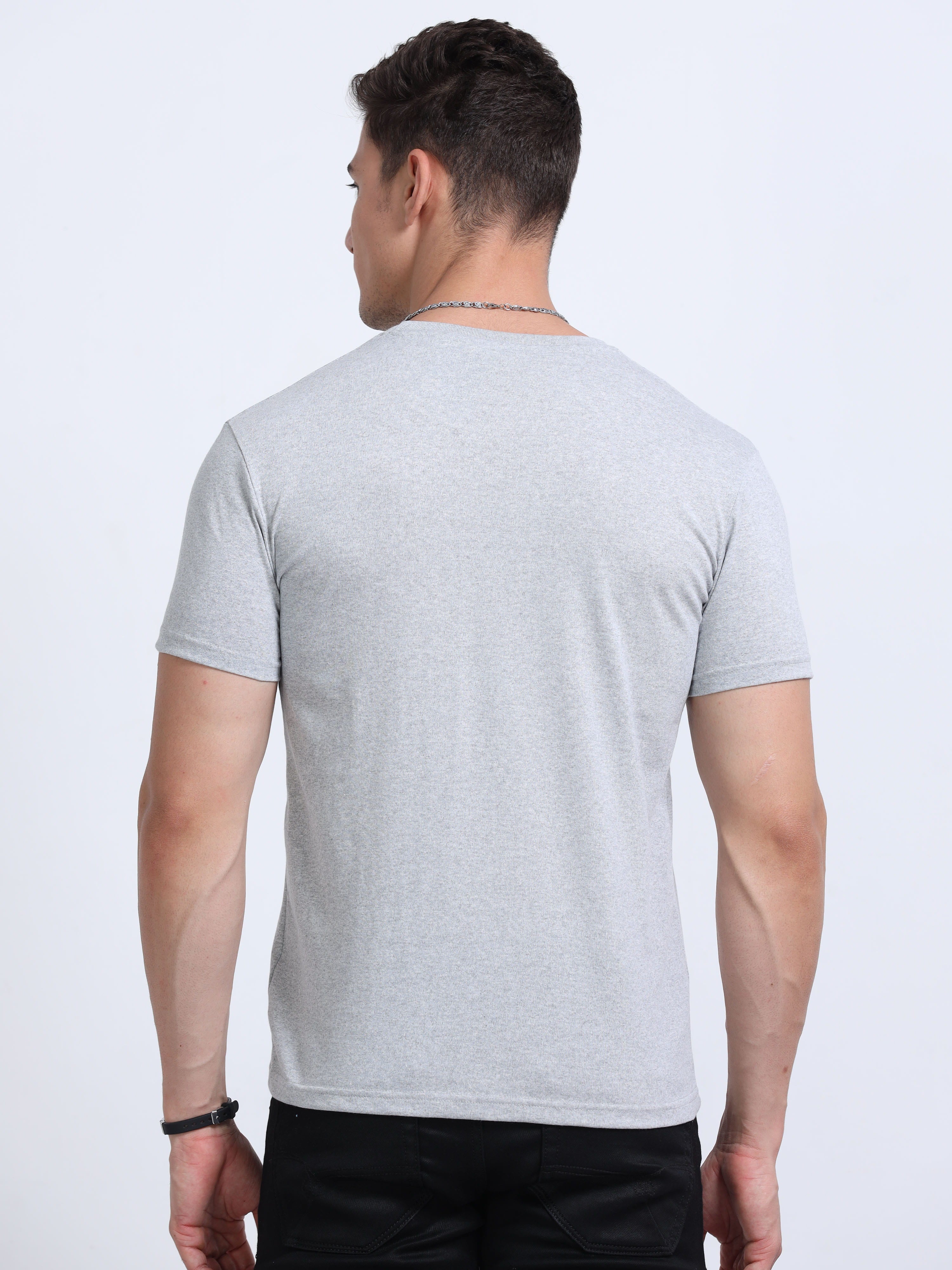 back view of man wearing t-shirt whose colour is Grey Melange .