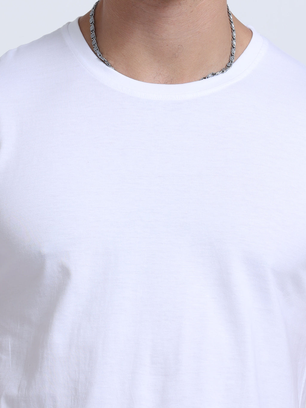 Man wearing a t-shirt with close view in  White 