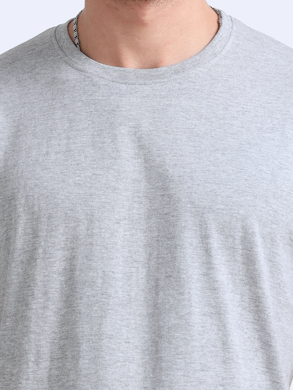man wearing a t-shirt with close view in grey melange 