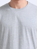 man wearing a t-shirt with close view in grey melange 