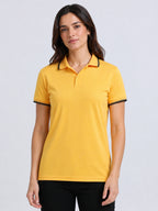 front view of primoknit drift polo tshirt unisex for women Yellow