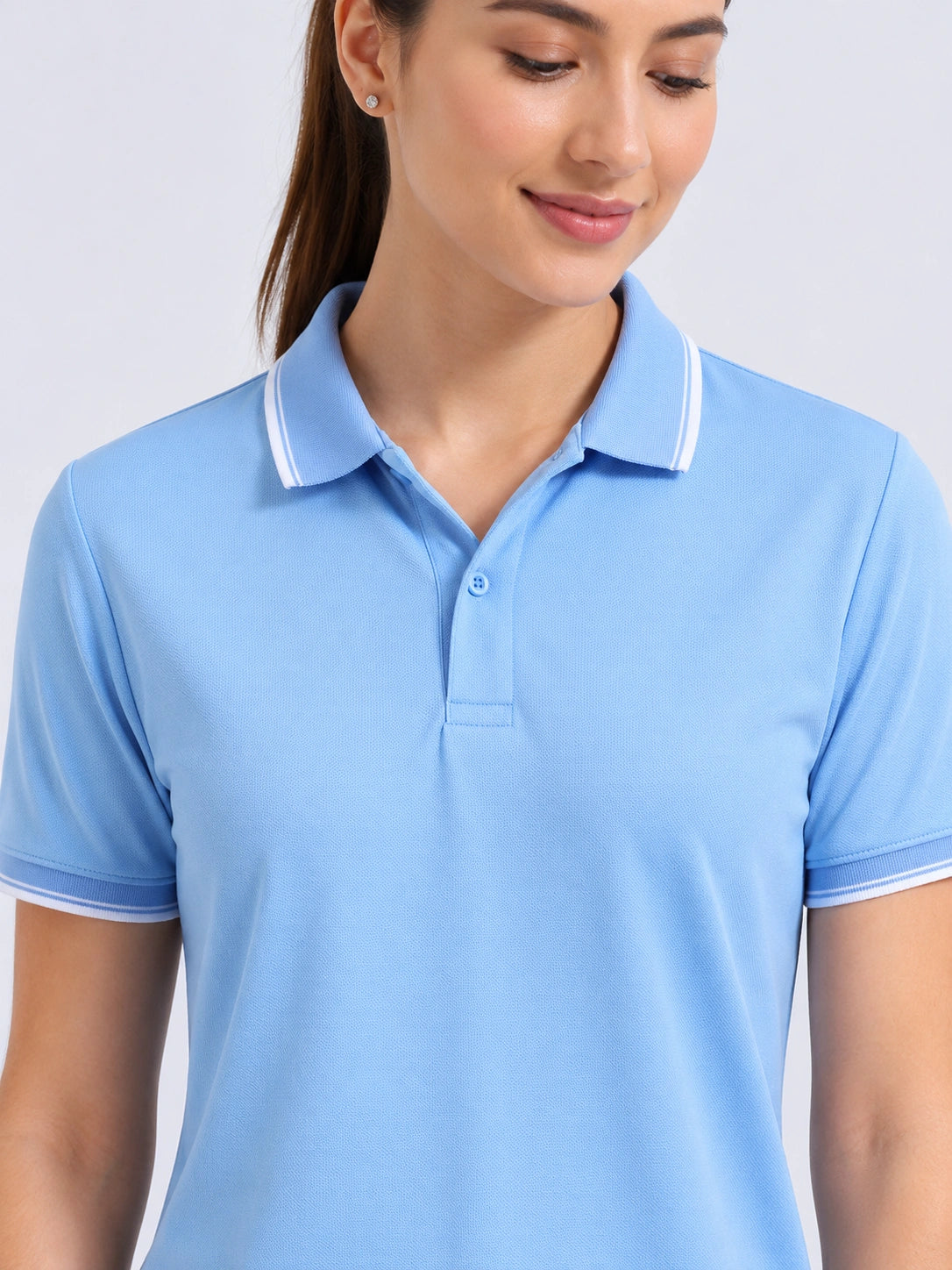 close view of primoknit drift polo tshirt unisex for women Sky Blue