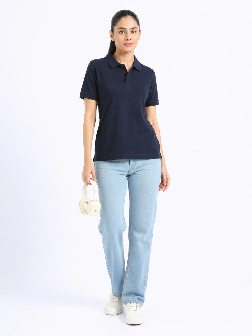photogenic view of women Wearing  organic cotton polo t-shirt navy blue