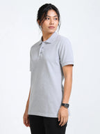 side view of women Wearing  organic cotton polo t-shirt Grey Melange .