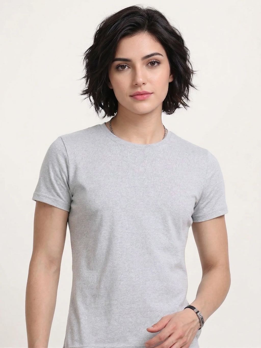 front view of woman wearing t-shirt whose colour is Grey Melange .