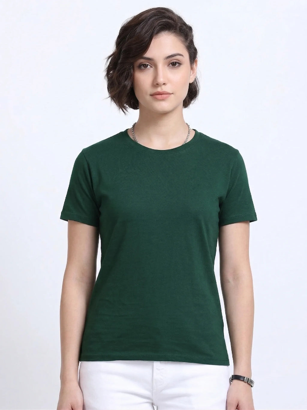 Woman wearing a t-shirt with front view in bottle green 