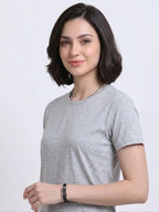 woman wearing a t-shirt with side view in grey melange 