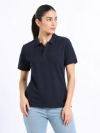 front view of women Wearing  organic cotton polo t-shirt navy blue
