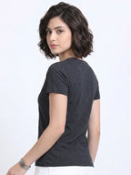 side view of woman wearing t-shirt whose colour is Charcoal 